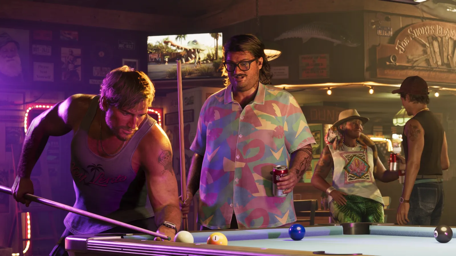 Jason and Cal playing pool in a bar.