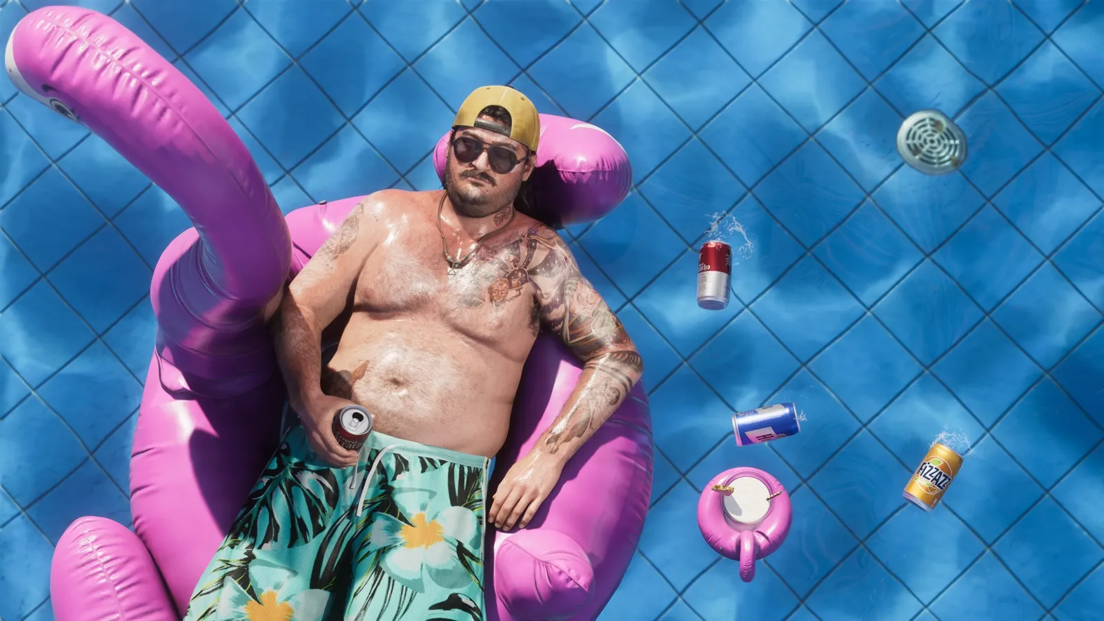 Cal lying on a flamingo floaty in a pool full of cans.