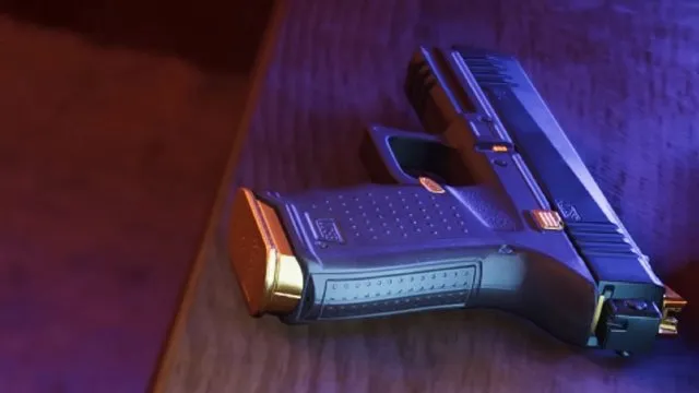 Close-up of a black semi-automatic pistol resting on a table under purple lighting, from an official GTA 6 screenshot