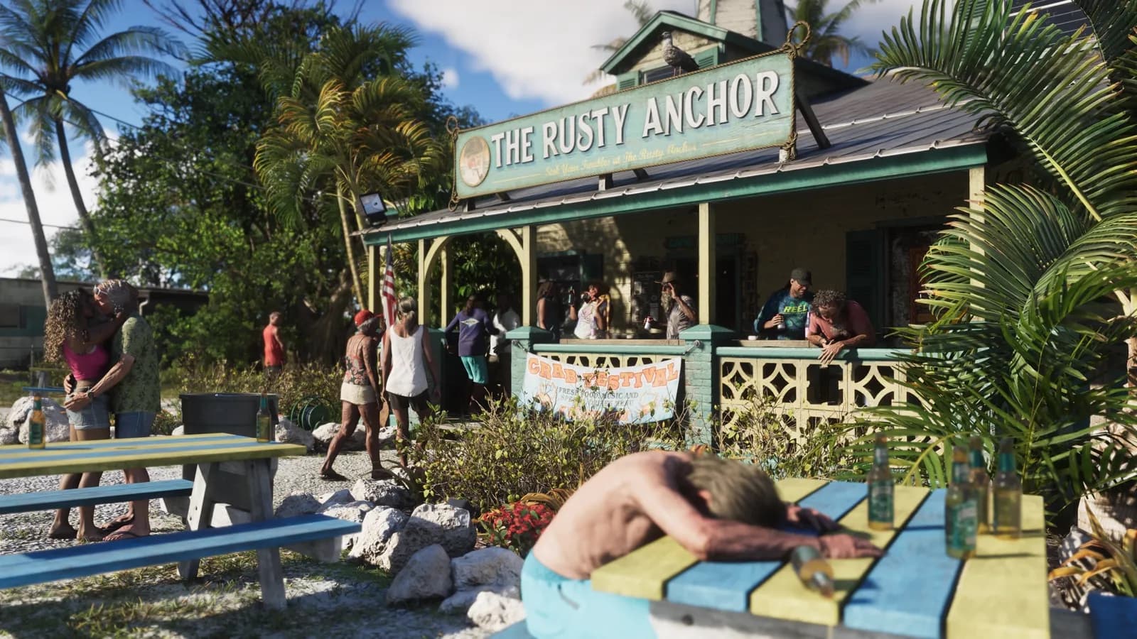 The Rusty Anchor beach bar in the Leonida Keys, a man passed out at a picnic table.